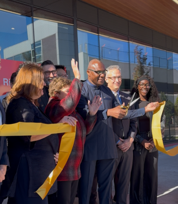 Carleton University president and vice-presidents cut the ceremonial ribbon to officially open Rideau House residence.