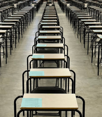 Rows of exam desks in the Fieldhouse