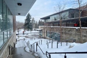 The stairs next to Azrieli Pavilion on a snowy day with Azrieli Theatre on the right.