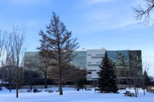 The quad covered in a blanket of fresh snow - in front of the MacOdrum Library.